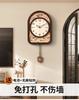 Creative silent light luxury wall clock living room home non-punching clock retro high sense 2025 new wall clock