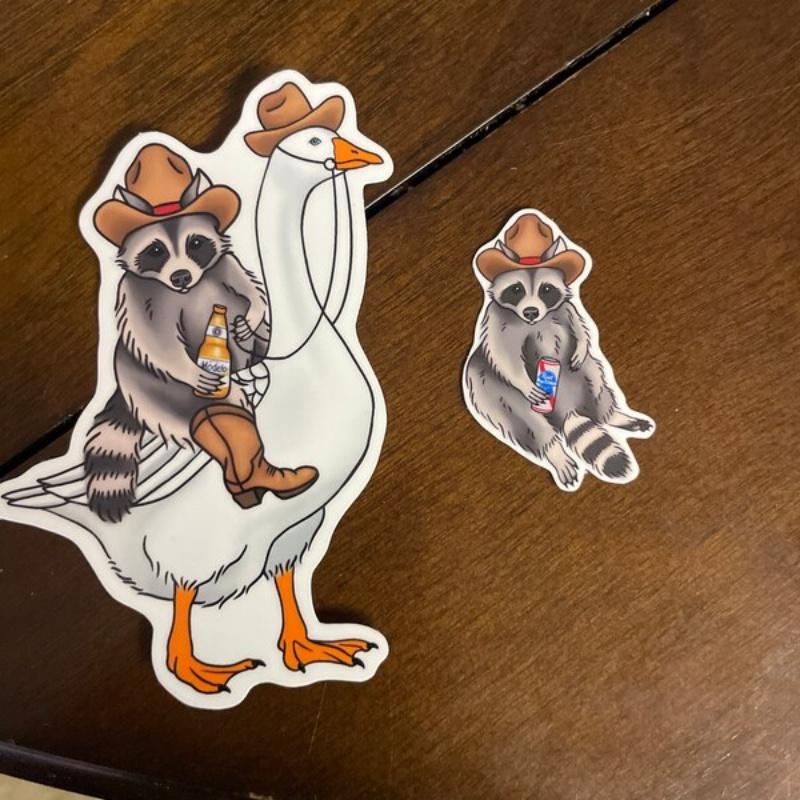 Cowboy Raccoon on a goose with a beer | funny raccoon sticker