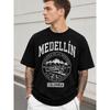 Herren schwarzes Grafik-T-Shirt mit Print der Bergstadt Medellín Kolumbien, lockere Passform, kurzärmelig, Rundhalsausschnitt, Baumwollmischung, lässiges Streetwear-Oberteil