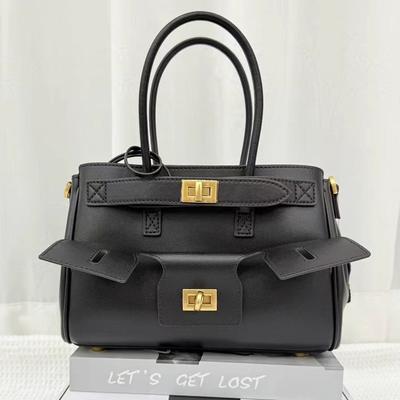 2025 New High Quality Neutral Hot Girl Motorcycle Bag Fashion Versatile Commuter Women's Bag Lock Tote Wing Bag