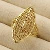 Huitan Marquise Shaped Women Gold Color Ring Hollow Design Noble Accessories for Party Daily Charming Wedding Metal Lady Jewelry