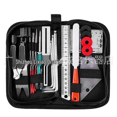 Kit di Strumenti per la Manutenzione della Chitarra e il Cambio delle Corde (W005)