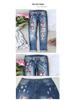 Women's Ripped Straight Leg Jeans with Santa Claus Patches - 2025 New Style