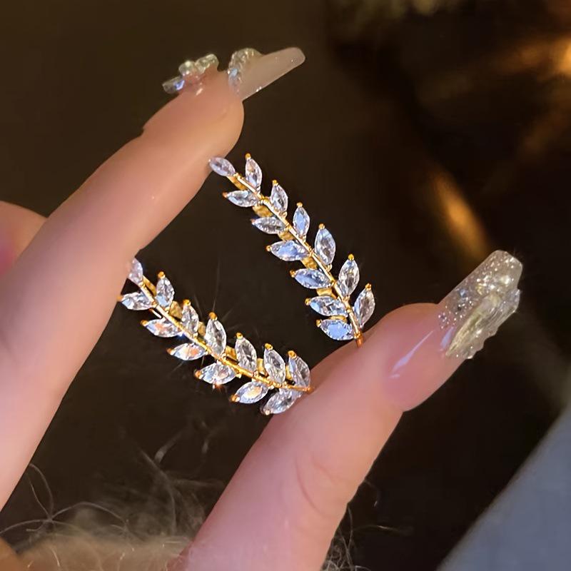 Elegant Zircon Wheat Leaf Earrings: Unique, Sparkling, and Versatile.
