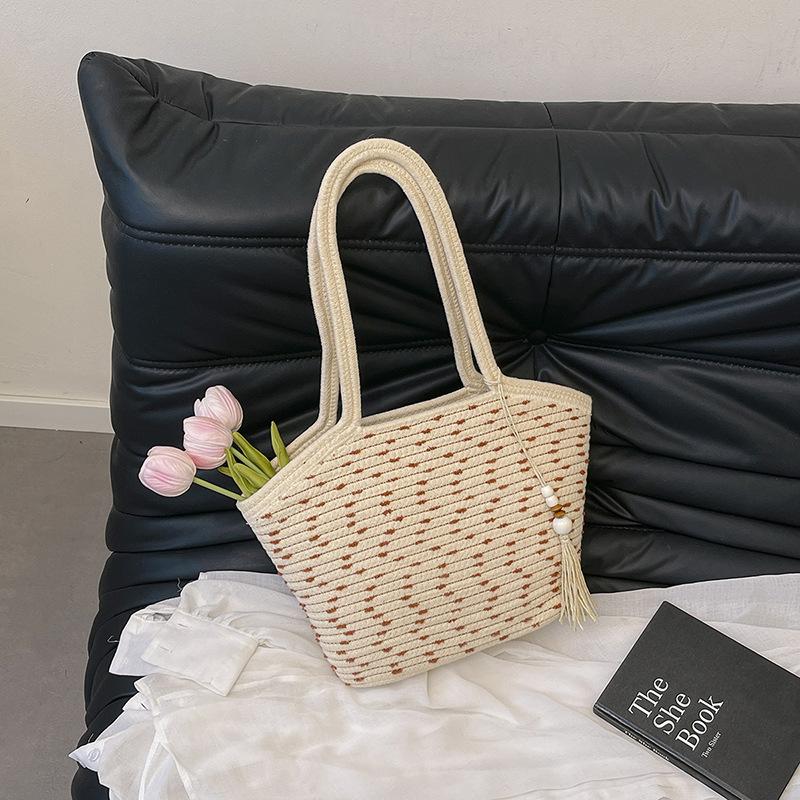 

2025 лето новый темперамент литературный большая вместимость плетеная сумка многофункциональная в иностранном стиле портативная подмышечная пляжная сумка белый