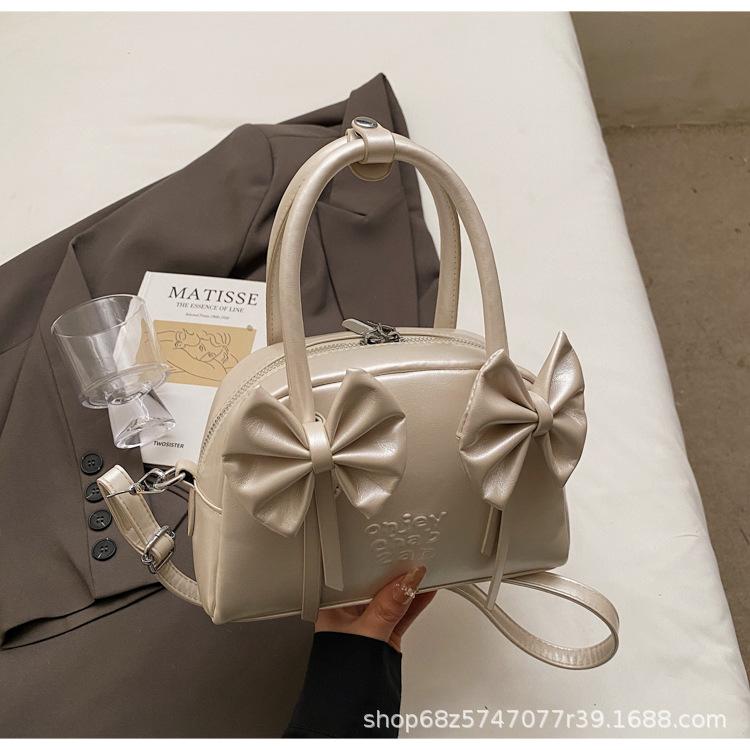 Shoulder bag fresh 2025 new women's bag Korean fashion bow new hand-to-hand small women's bag crossbody shell bag