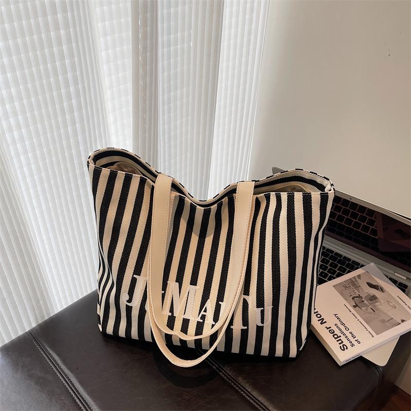 

Striped canvas bag women s summer new casual large-capacity tote bag student class commuting shoulder bag чёрный