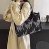 Fashion Trend Embossed Handbag 2025 College Student Versatile Large Capacity Commuting Appearance Handheld Canvas Shoulder Bag