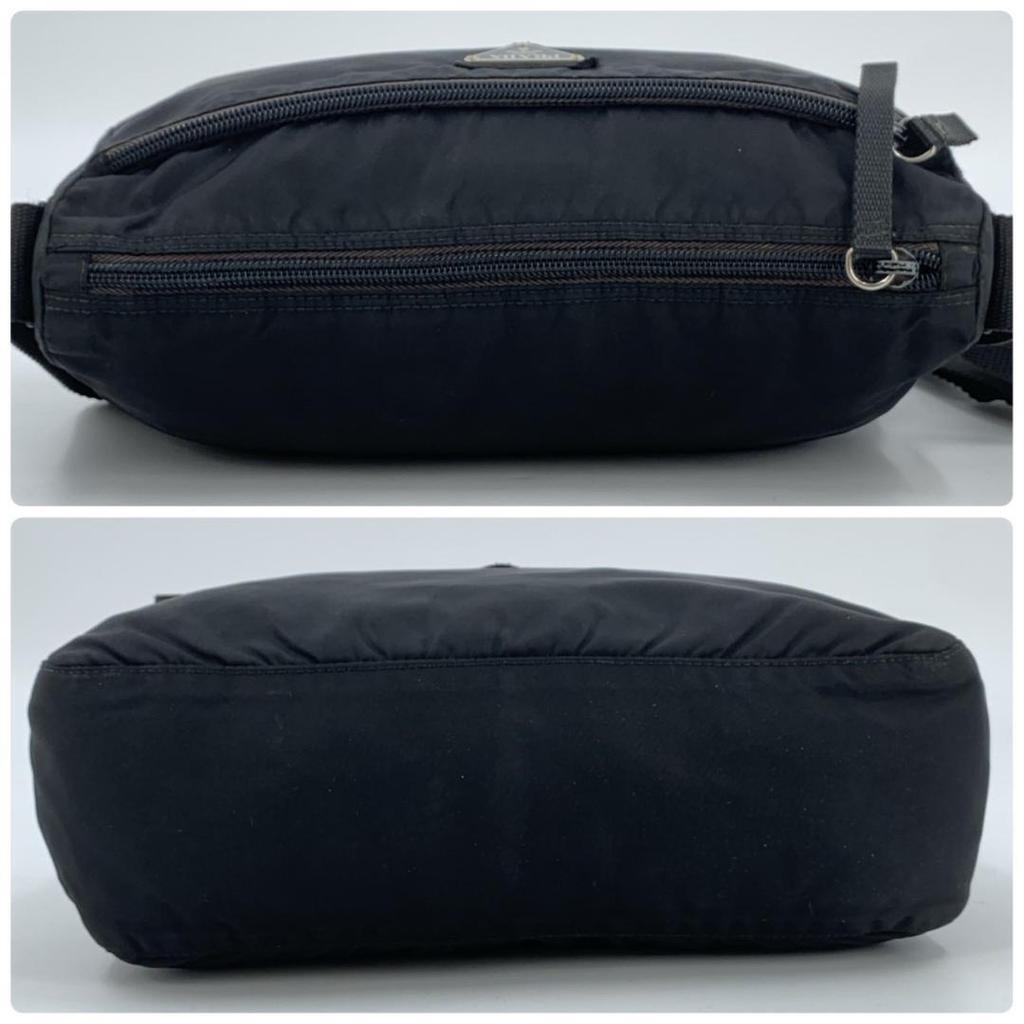 Prada Pocono Schultertasche Kameratasche Crossbody Tessuto Nylon Leder Schwarzer Schultergurt Crossbody Dreieckiges Logo-Schild Weißes Etikett