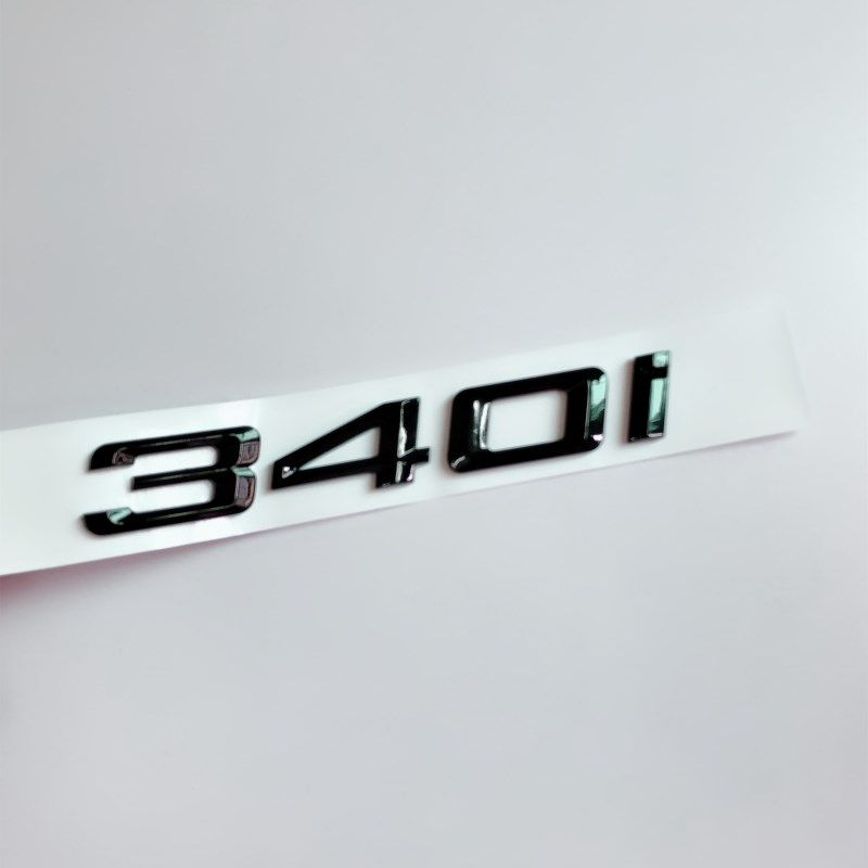 

Suitable for BMW 3 Series glossy black 330Li 320i 328Li M335 fender M side emblems and numeric M rear emblems