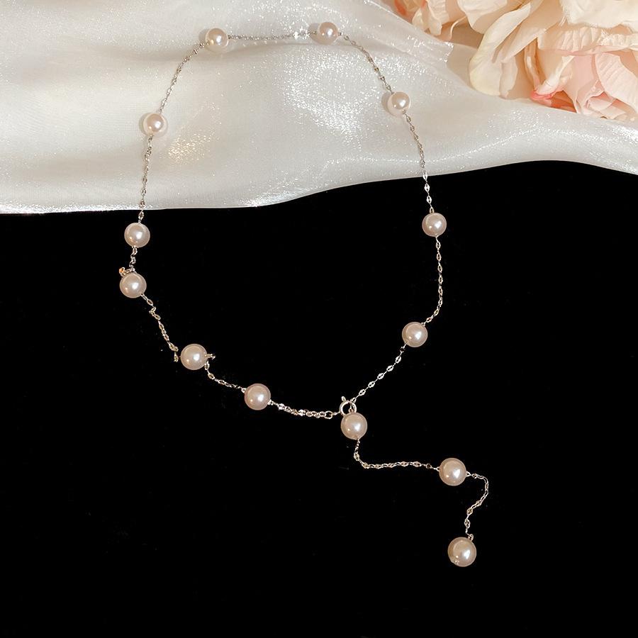 Retro Irregular Bow & Heart Tassel Necklace - Cool Versatile Clavicle Chain for Autumn & Winter