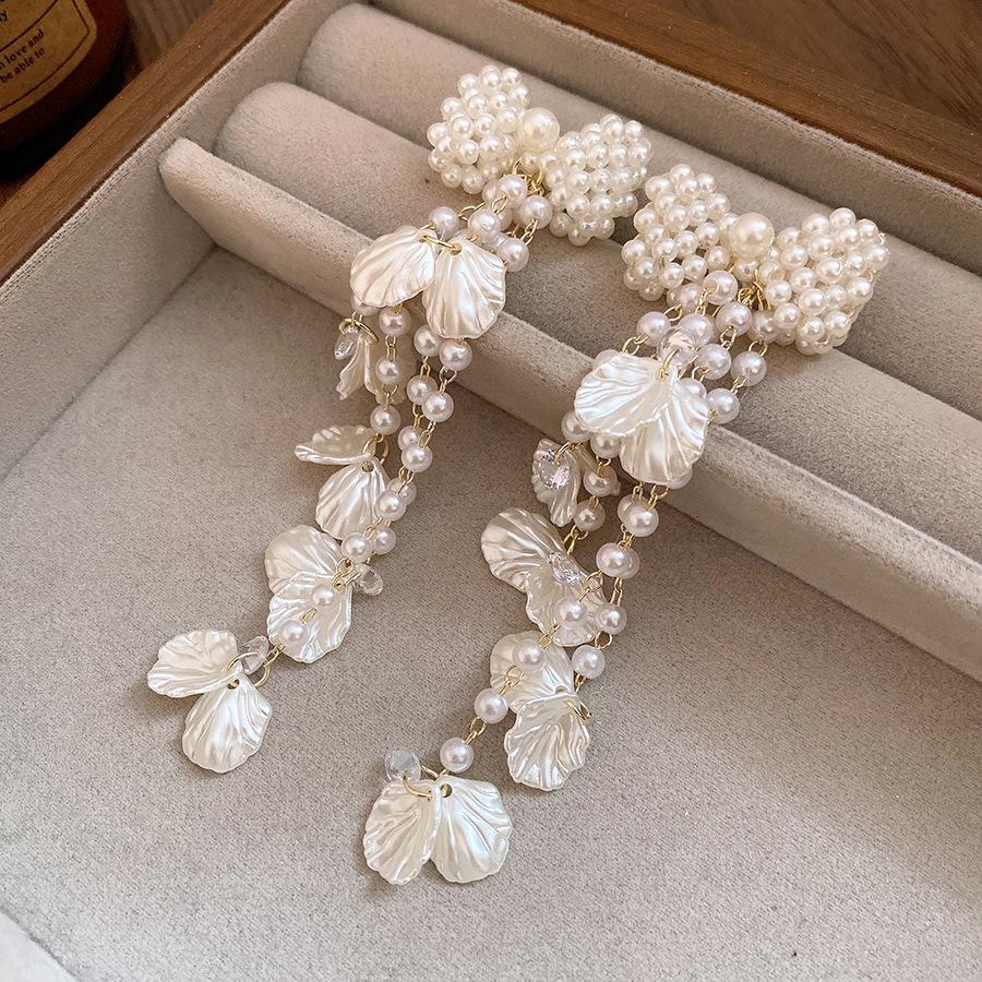 

Silver needle zircon pearl bow fringed earrings retro sweet temperament earrings fashion light luxury high-end earrings