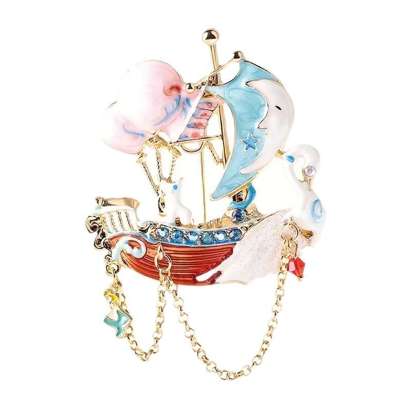 

Модна брошка з металевими стразами та перлами аксесуар рожевий