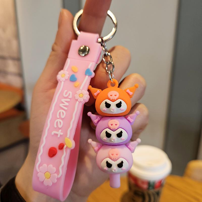 Yugui Dog Gestapelter Le Schlüsselanhänger Niedlicher Cartoon Melody Pudding Dog PVC Puppe Taschenanhänger