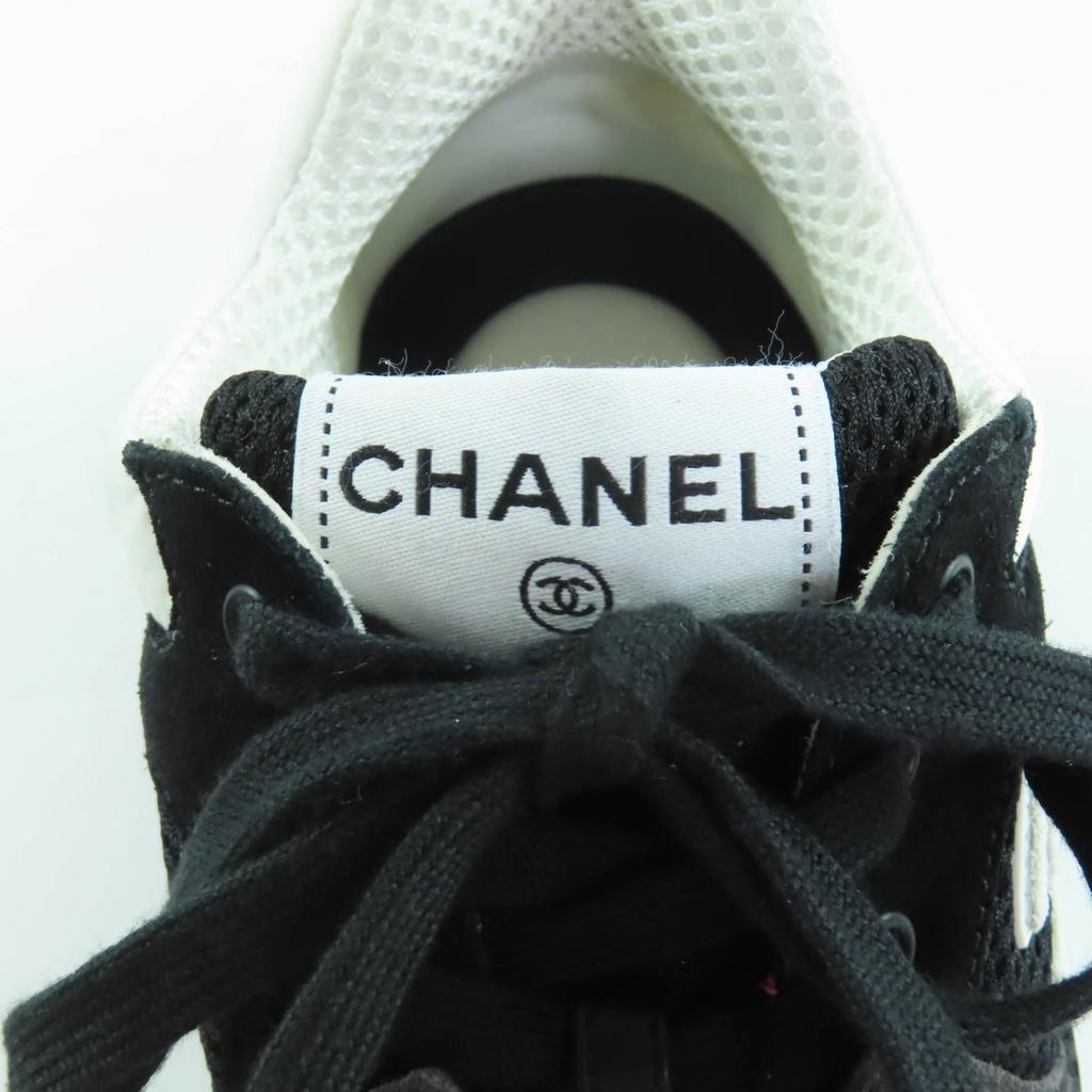 Ausgezeichnete CHANEL Sneaker Schwarz Weiß Leder Damen 37 G38299 Gebraucht