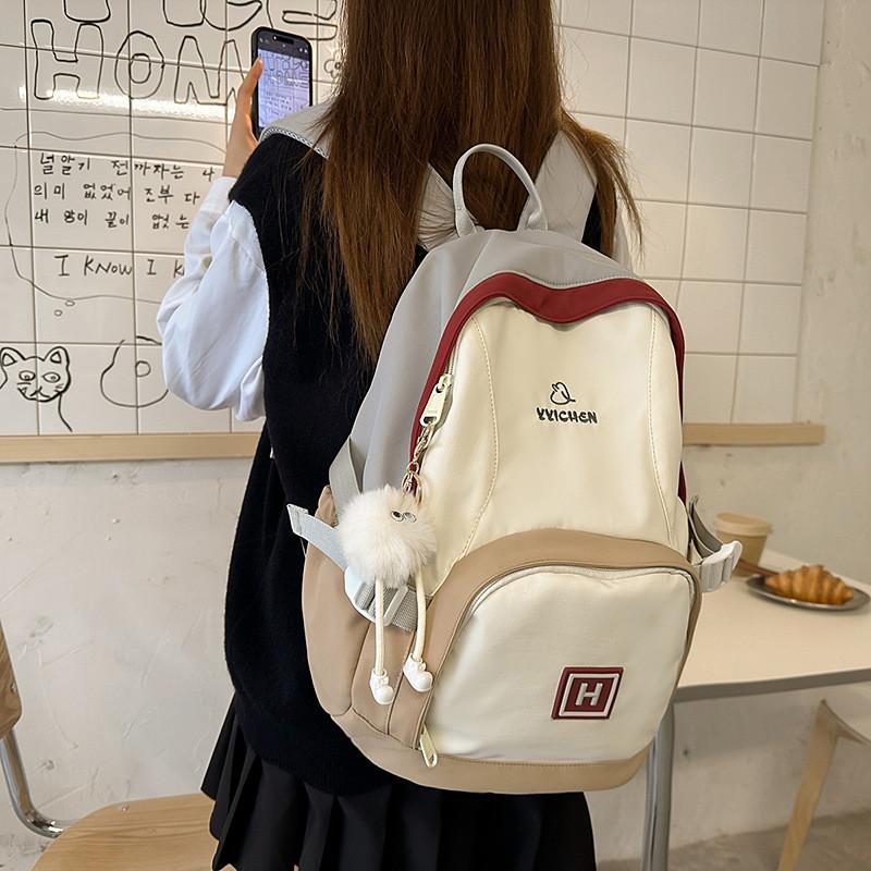 Color Blocked Fashionable Letter Pattern Student Backpack With Pendant Plush