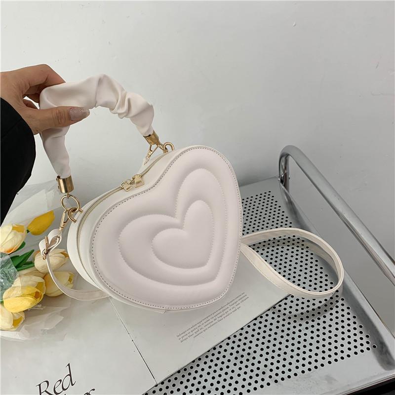 Adorable 2024 Heart Shaped Imprint Handbag For Girls Casual Fashionable Small Bag
