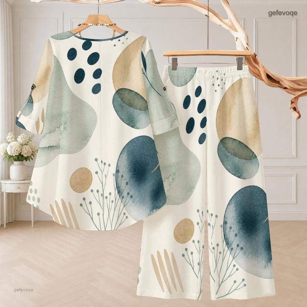Women Plus Size Round Neck Three Quarter Sleeve Printed High Low Top And Wide Leg Pants Two Piece Set