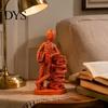 Abstract Human Sculpture for Bookshelf Resin Book Lover Statue, Reader Leaning On Stacked Book, Retro Style Bookish Home Decor Decorative Figurine