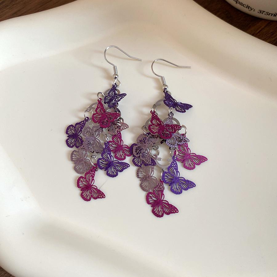 Hollow butterfly fringed ear hook seaside vacation style simple fashion temperament earrings niche high-end earrings