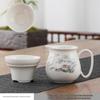 Ceramic Tea Set: Gong Dao Bei (Fairness Cup) with Strainer, Divider, Integrated Zisha Cup, and Tea Leaf Filter.