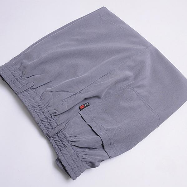 Nové letní pánské kalhoty tenkého dílu, volné prodyšné pánské kalhoty s vysokým pasem