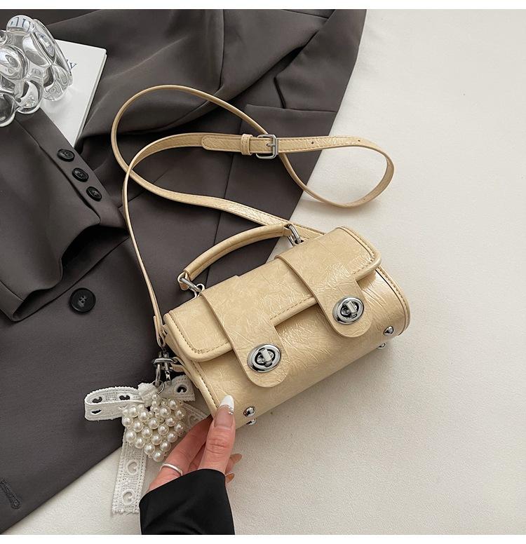 

Популярная в этом году женская сумочка 2025 весна и лето новая модная универсальная наплечная сумка-цилиндр нишевая сумка-мессенджер для женщин