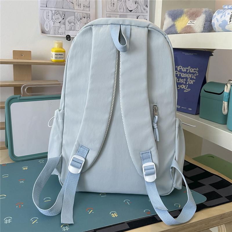 Cute Butterfly Embroidered School Backpack with Front Pocket Casual Daypack for Girls Daily Use