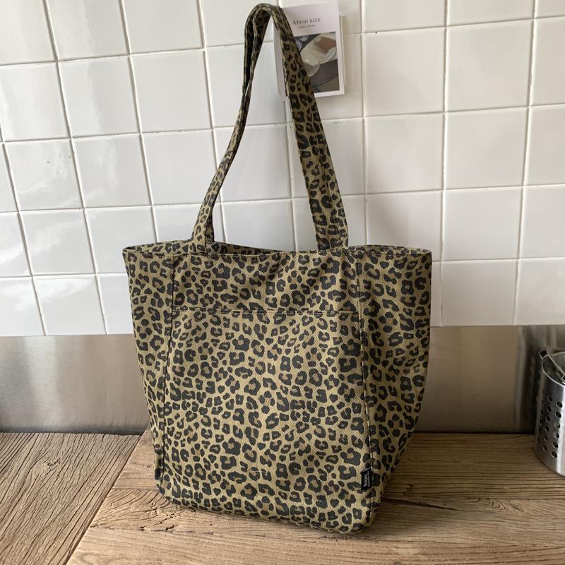 

Bags Women s tote bags Portable canvas bags 2025 summer new shoulder bags Commuter high value polka dot armpit bags цветной печати леопарда