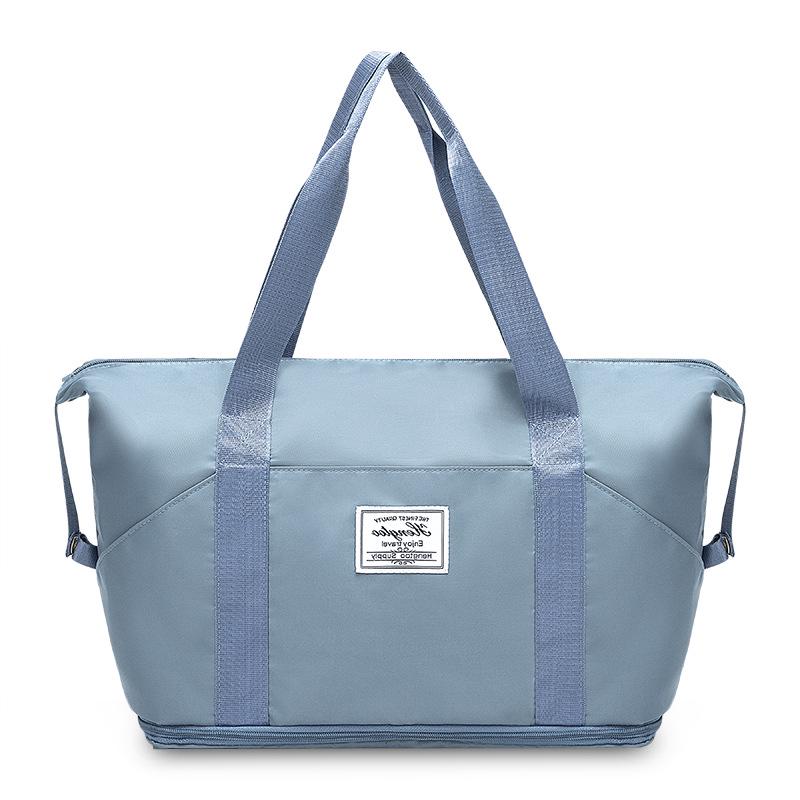 

Expandable Crossbody Fitness Bag: Large Capacity, Dry/Wet Separation, Unisex, High-End Training Sports Bag. 53*21*40CM синій