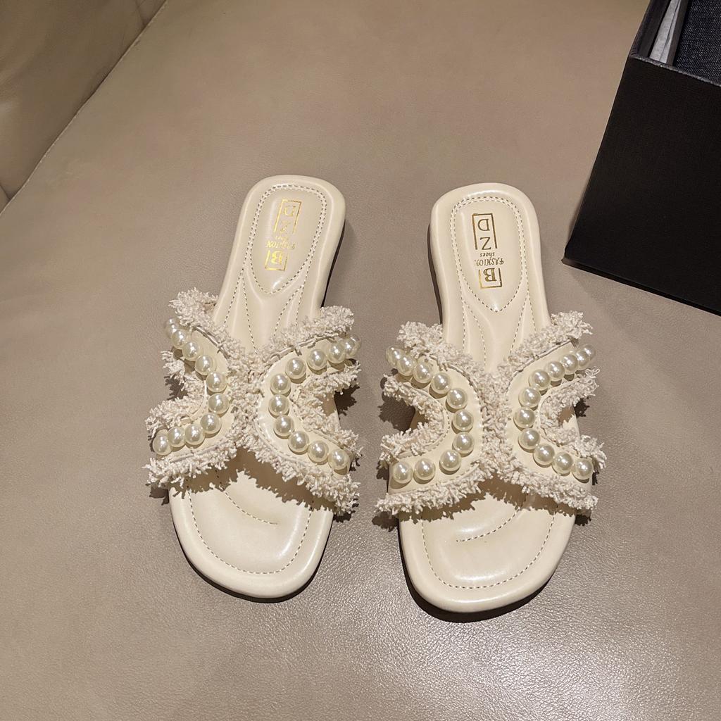 Small fragrant wind cool slippers women wear 2025 summer new fairy wind pearl fashion flat bottom one word slippers women tide