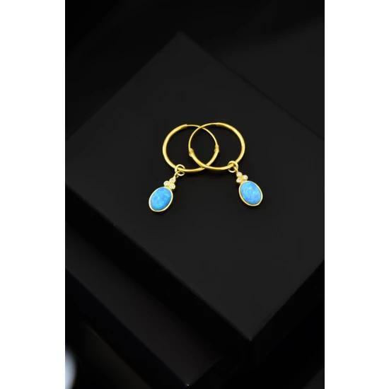 

Серебряные позолоченные серьги-кольца с овальным опалом и камнем