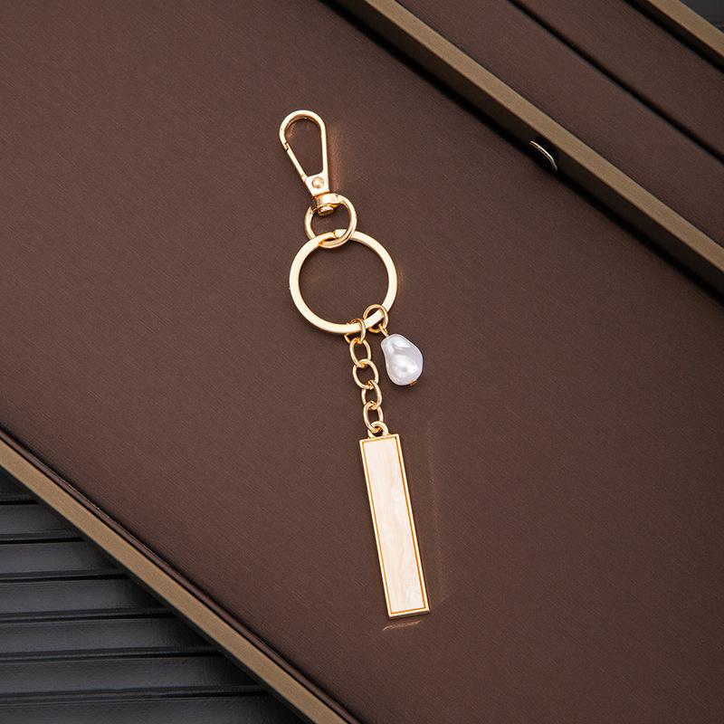 Chaveiro Pingente Nome Letras Criativas 26 Letras Pérola Imitação Concha Pingente de Bolsa Popular Acessórios