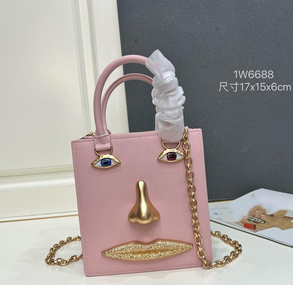 26 trendy new schiap face women's bag plain weave cowhide chain design sense hand-held tote bag