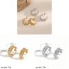 Geometrische Ohrringe aus Edelstahl mit Strass und texturiertem Design für Damen