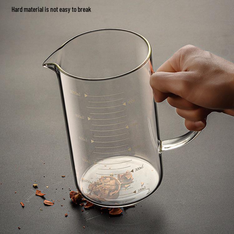 High-Temperature Resistant Glass Measuring Cup with Handle, for Baking, Milk, Juice, or Water.