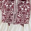 A New Spring Women's Fashion and Casual Long-sleeved Shirt with A Round Neck and Printed Necklaces