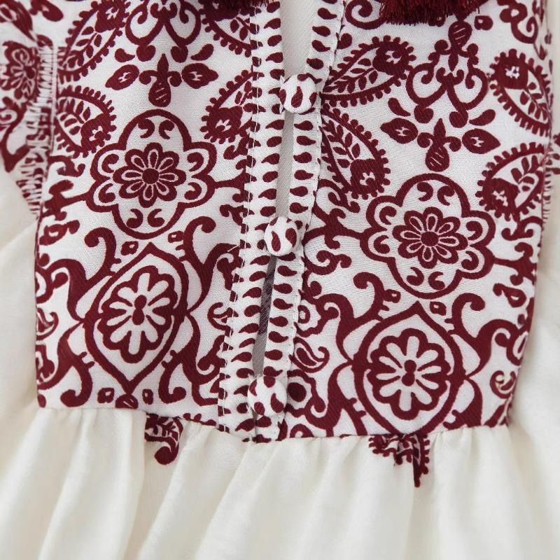A New Spring Women's Fashion and Casual Long-sleeved Shirt with A Round Neck and Printed Necklaces