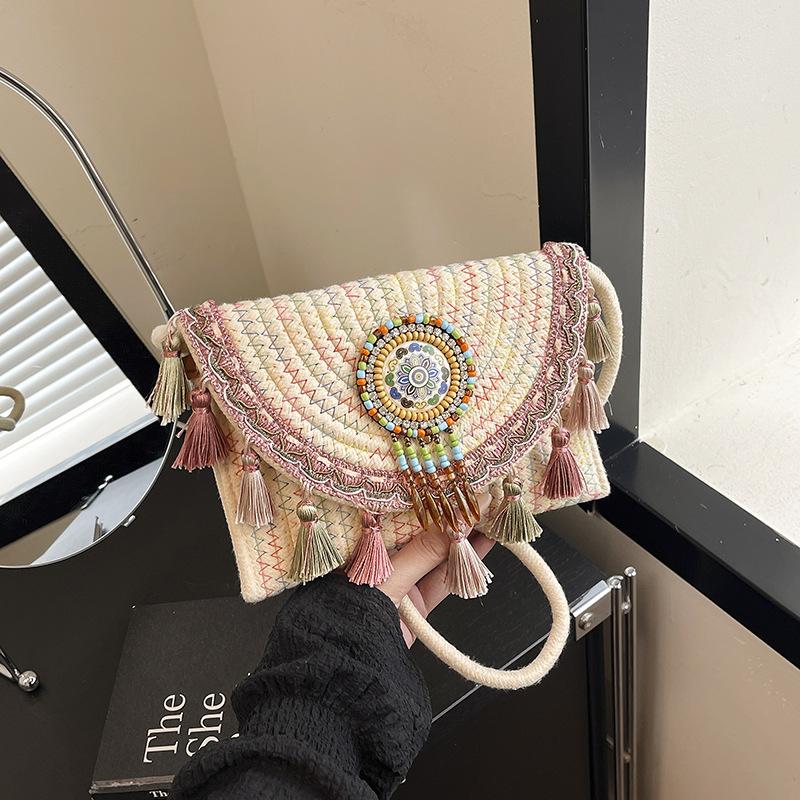 

Contrasting color hand-woven fringed small square bag new summer versatile casual shoulder messenger bag