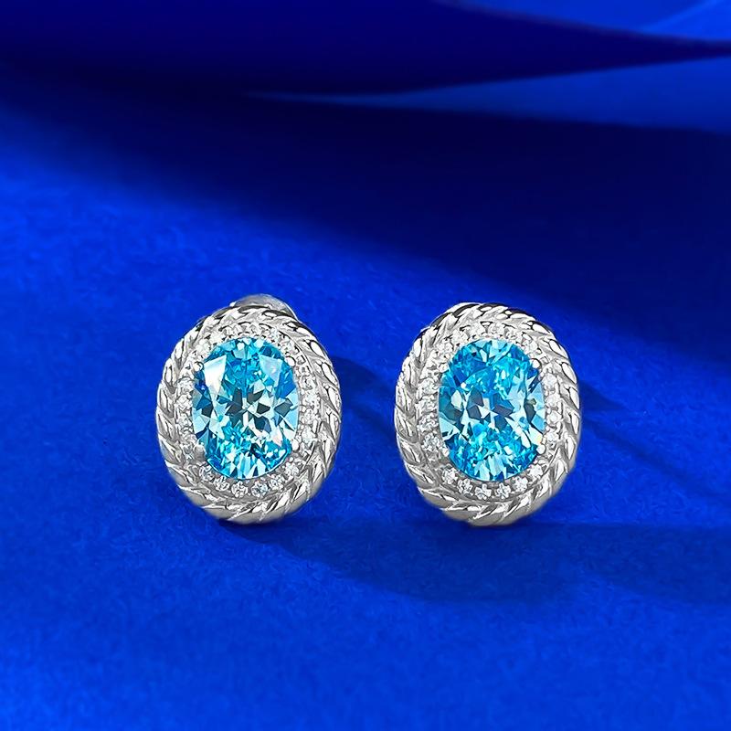 

Серьги-пусеты с небесно-голубым камнем 1,5 карата, темперамент легкой роскоши 925 Silver