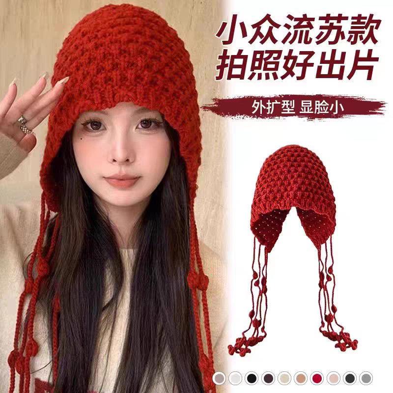 Autumn and winter warm wool hat, hand-woven hollow bag hat, women's ethnic style fringed ear protector, knitted hat
