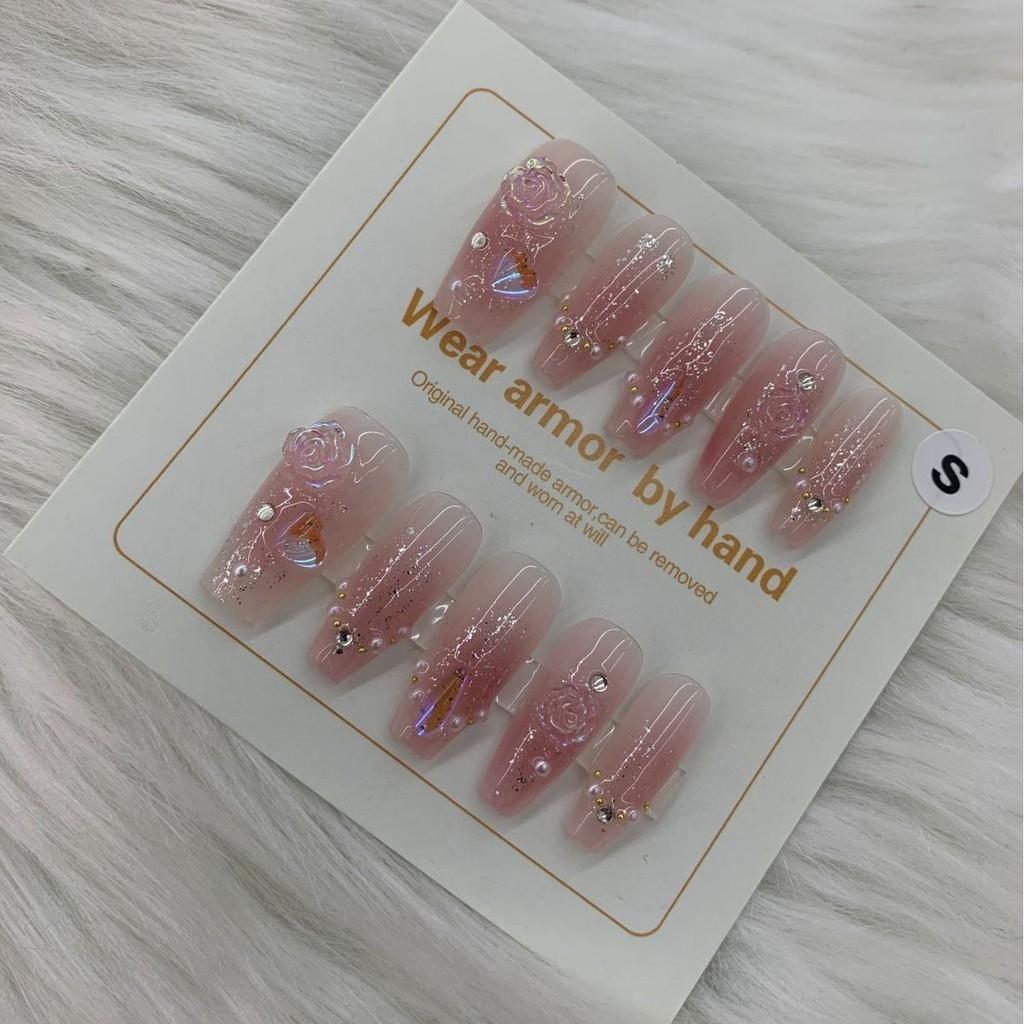 Handworn Nail Art With White Aurora Camellia Blush Advanced Style Temperament