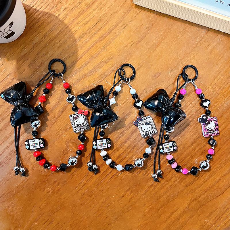 Creative new cat bow beaded mobile phone chain keychain exquisite cute bag pendant small gift wholesale