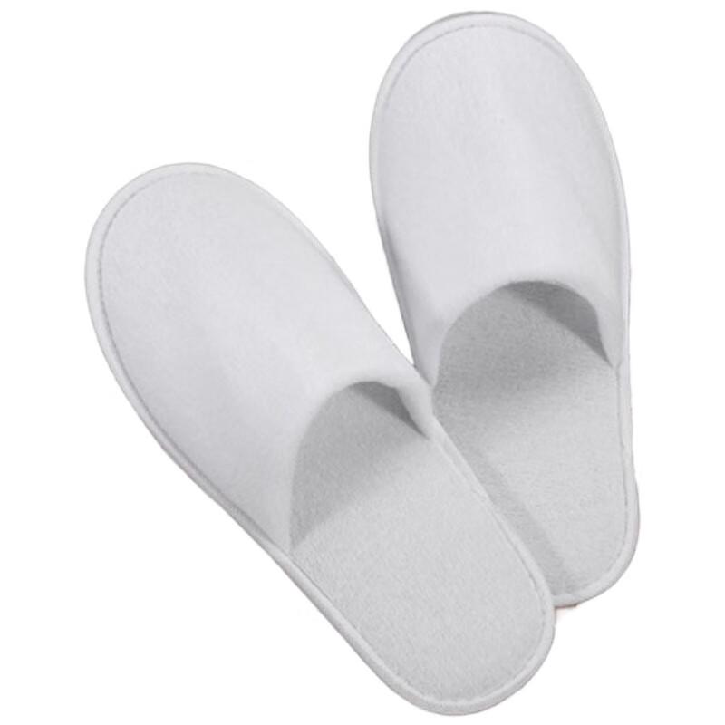 Одноразовые гостиничные тапочки чисто белого цвета