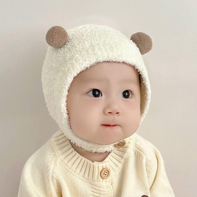 Super cute baby autumn and winter new children's thermal hat cute double ball hat warm ear protector knitted wool hat