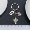 Antique Silver Cactus Keychain: Hollowed Desert Alloy Ornament & Backpack Accessory