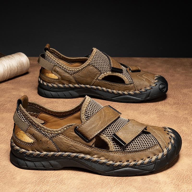 

Розпродаж сандалі чоловічі літні шкіряні сітчасті з закритим носком дихаючі пляжні туфлі великого розміру 48