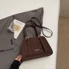 Korean version of high-value niche shoulder bag 2025 autumn new solid color fashion trend glossy underarm handbag women