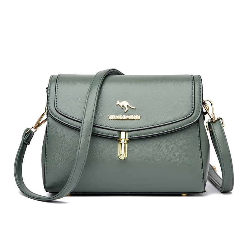 

жіноча нова мода жінка середнього віку, мати, міська проста жіноча сумка на плечі зелений