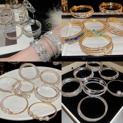 French Rhinestone Multi-Layer Bracelet: Elegant Light Luxury Bangle with Exaggerated Design.